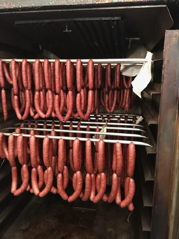 Ring sausage hanging in the smoker
